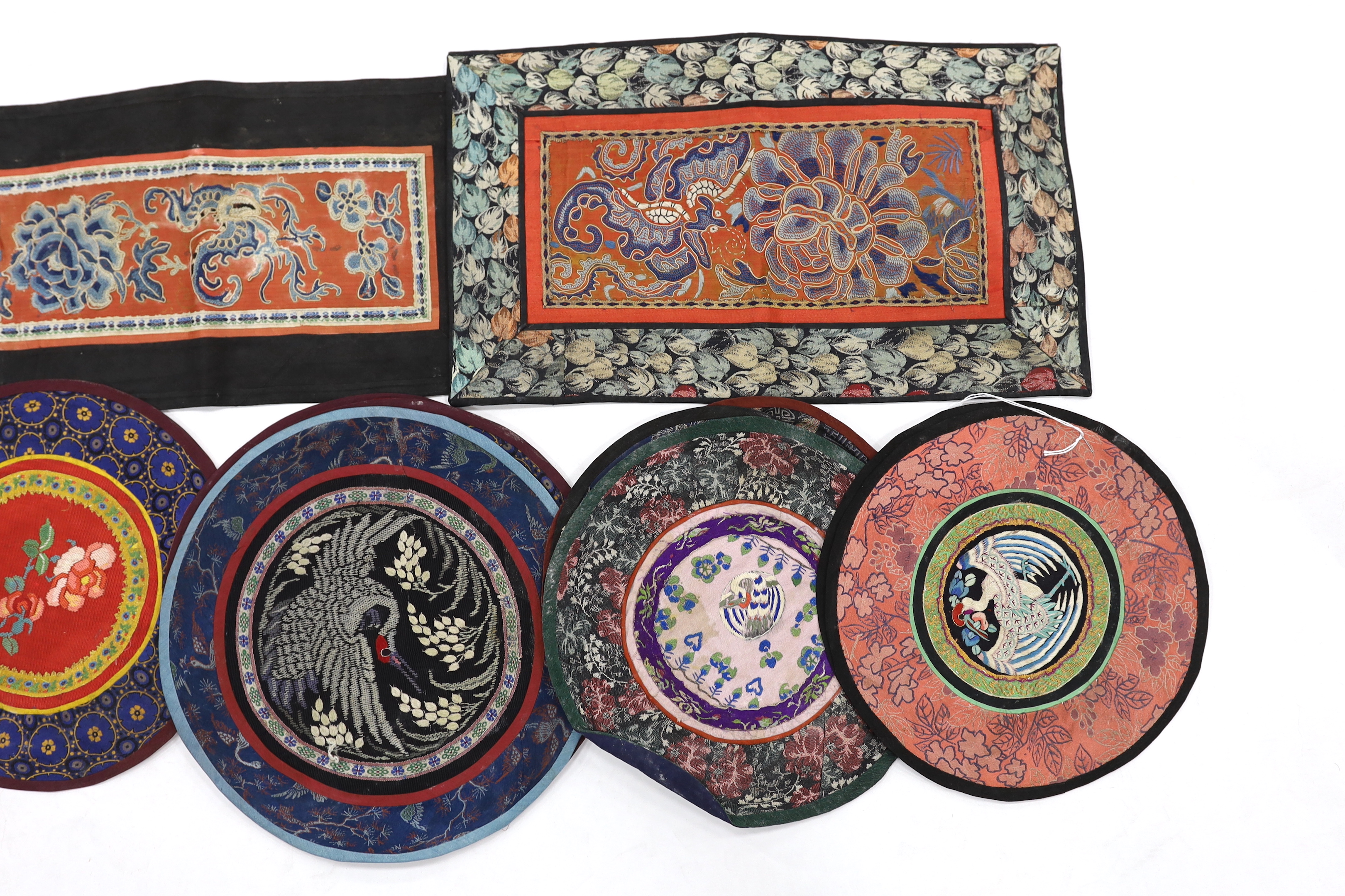 Three Beijing knot silk embroidered rectangular mats with damask borders, seven circular bird motif embroideries and two of deer and birds (12)